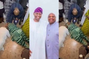 Gov Adeleke prostrates for elder brother after election victory